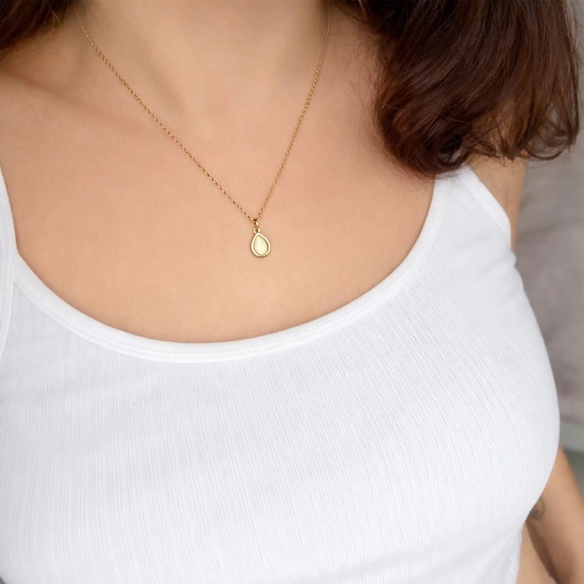 Sera Teardrop Pendant Necklace gold on model neck — Tamola Jewellery
